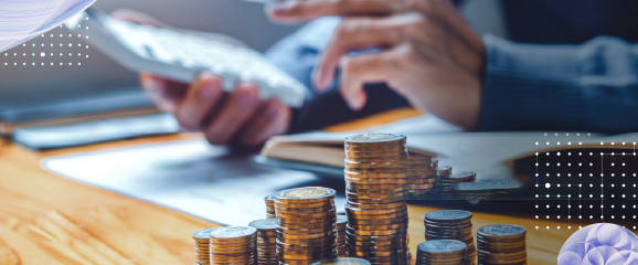 Stacks of coins represent decision intelligence in finance, improving risk assessment and fraud detection strategies