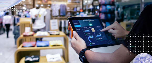 Individual using a tablet for data analysis, showcasing decision intelligence optimizing retail inventory and demand